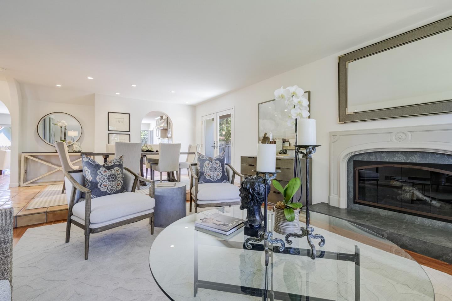 370 Quinnhill Road Los Altos, CA 94024 - Photo 14 of 58 a living room with furniture and a fireplace