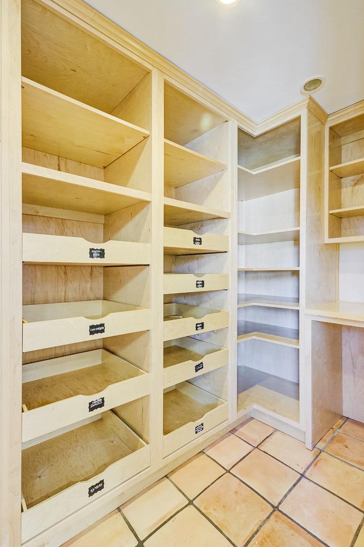 370 Quinnhill Road Los Altos, CA 94024 - Photo 27 of 58 a view of walk in closet with empty racks