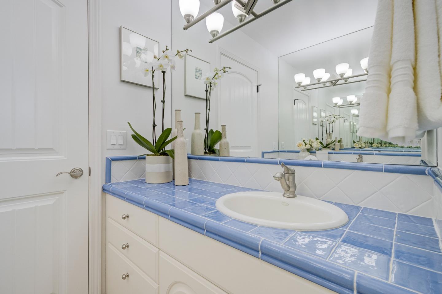 370 Quinnhill Road Los Altos, CA 94024 - Photo 30 of 58 a bathroom with a sink and a mirror