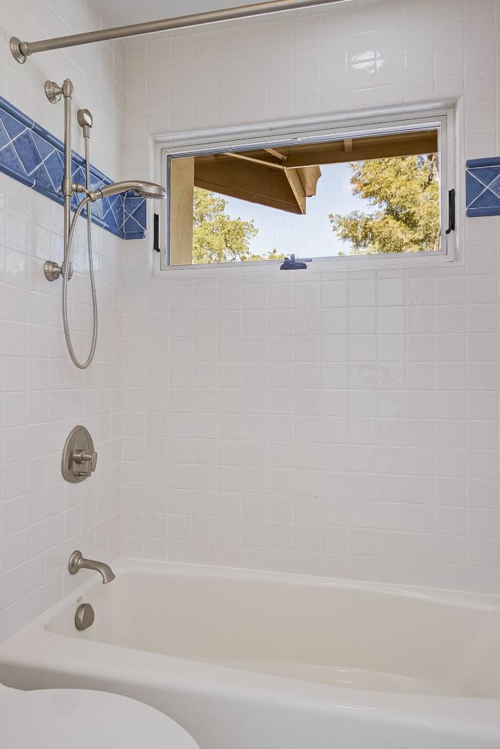 370 Quinnhill Road Los Altos, CA 94024 - Photo 31 of 58 a bathroom with a bathtub and shower