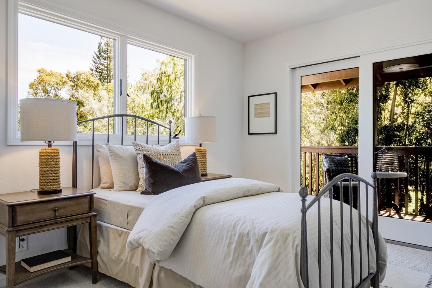 370 Quinnhill Road Los Altos, CA 94024 - Photo 34 of 58 a bedroom with a bed a large window with outer view