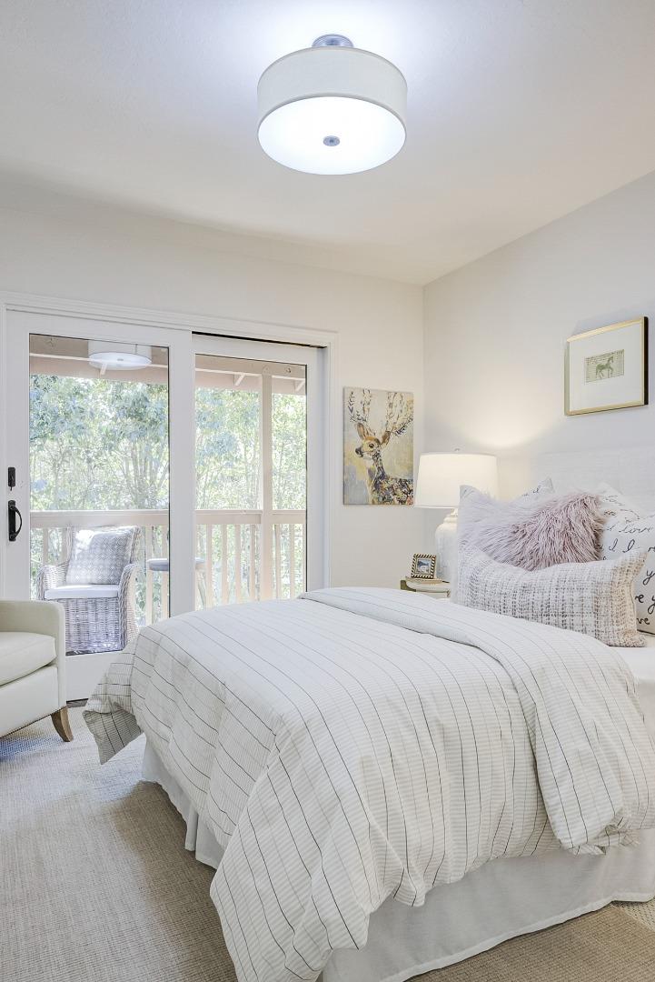 370 Quinnhill Road Los Altos, CA 94024 - Photo 36 of 58 a bedroom with a large bed and a large window