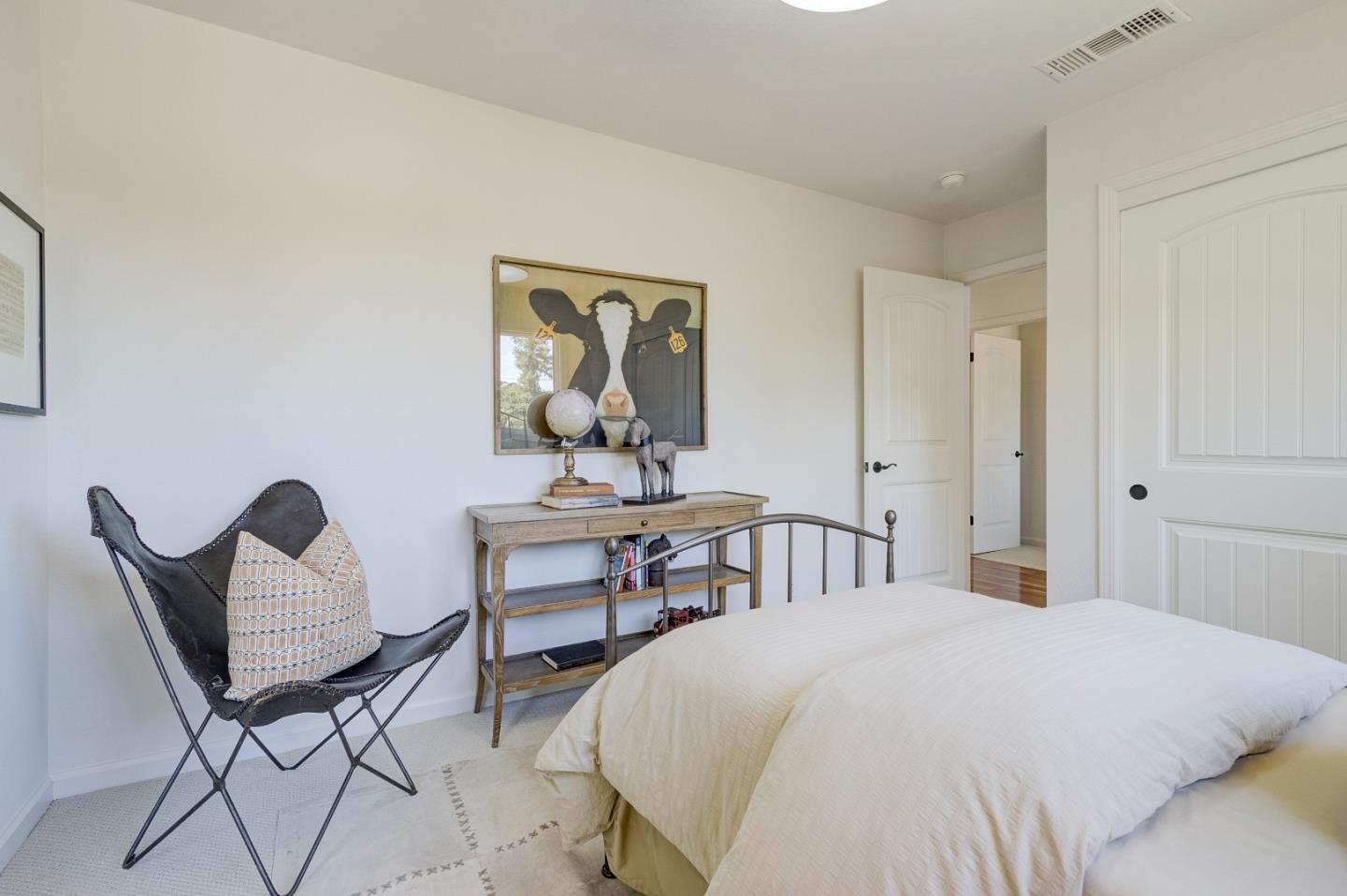 370 Quinnhill Road Los Altos, CA 94024 - Photo 37 of 58 a bedroom with a bed and a table