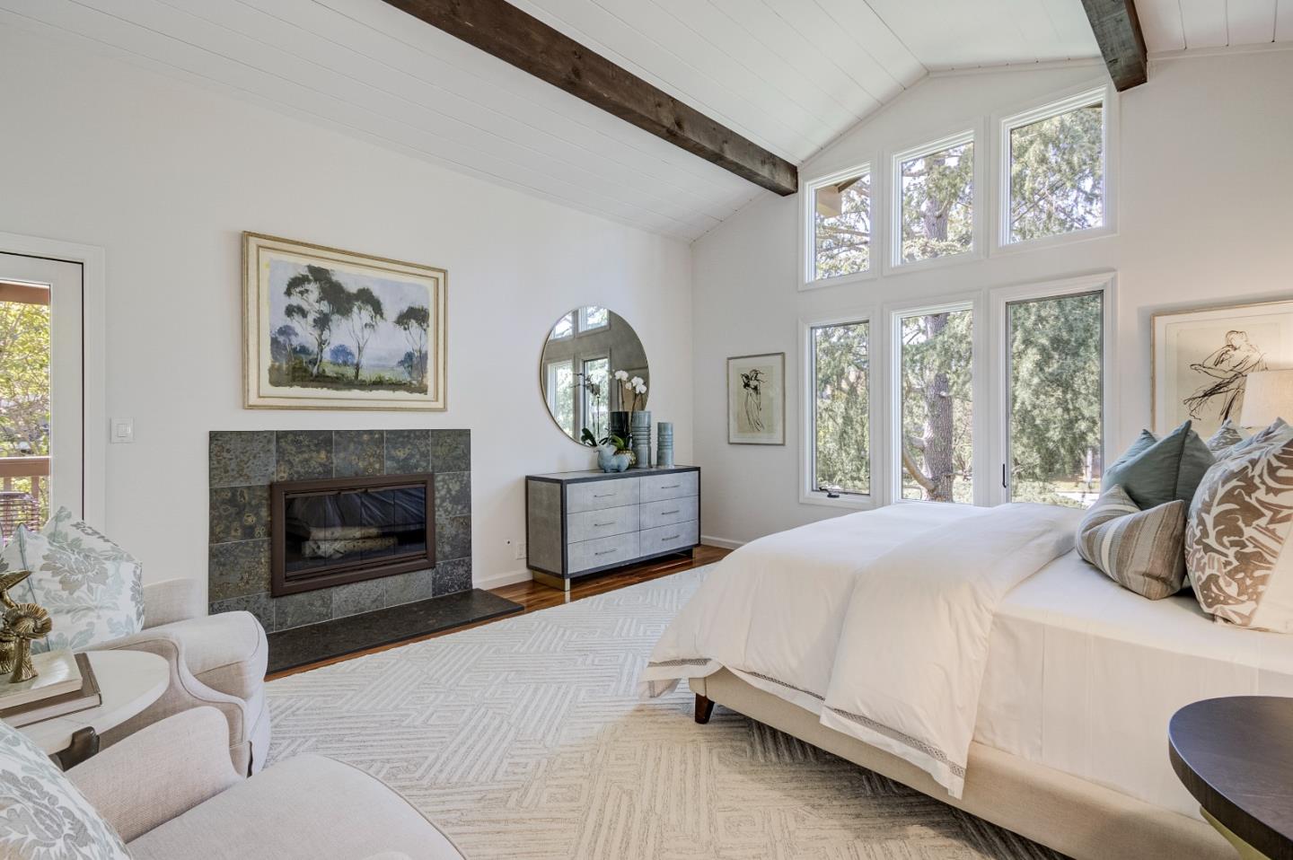 370 Quinnhill Road Los Altos, CA 94024 - Photo 41 of 58 a bedroom with a bed and a fireplace