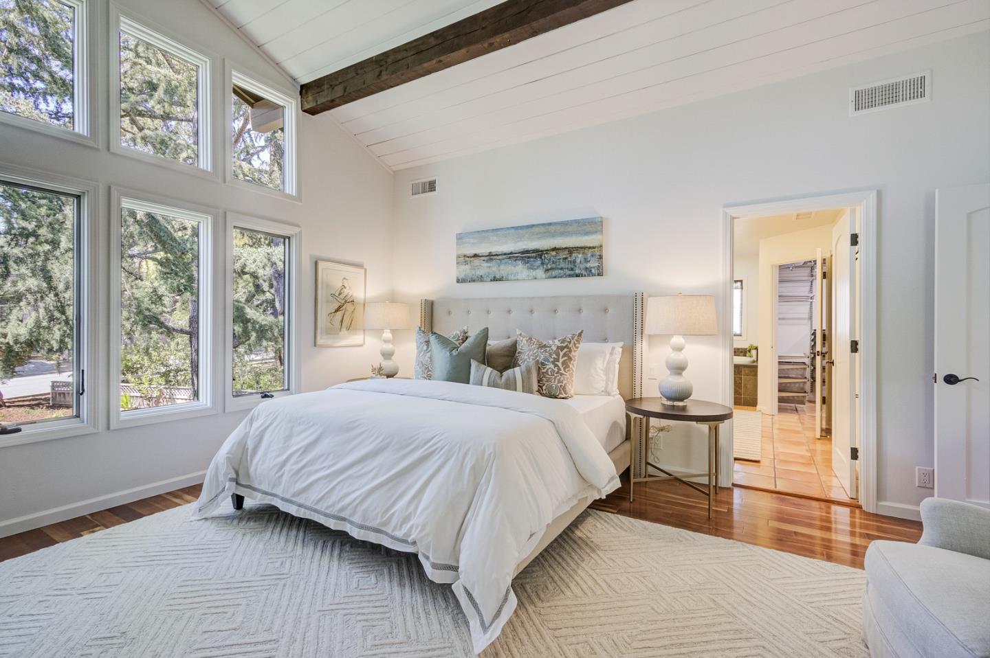 370 Quinnhill Road Los Altos, CA 94024 - Photo 42 of 58 a bedroom with a bed and a large window