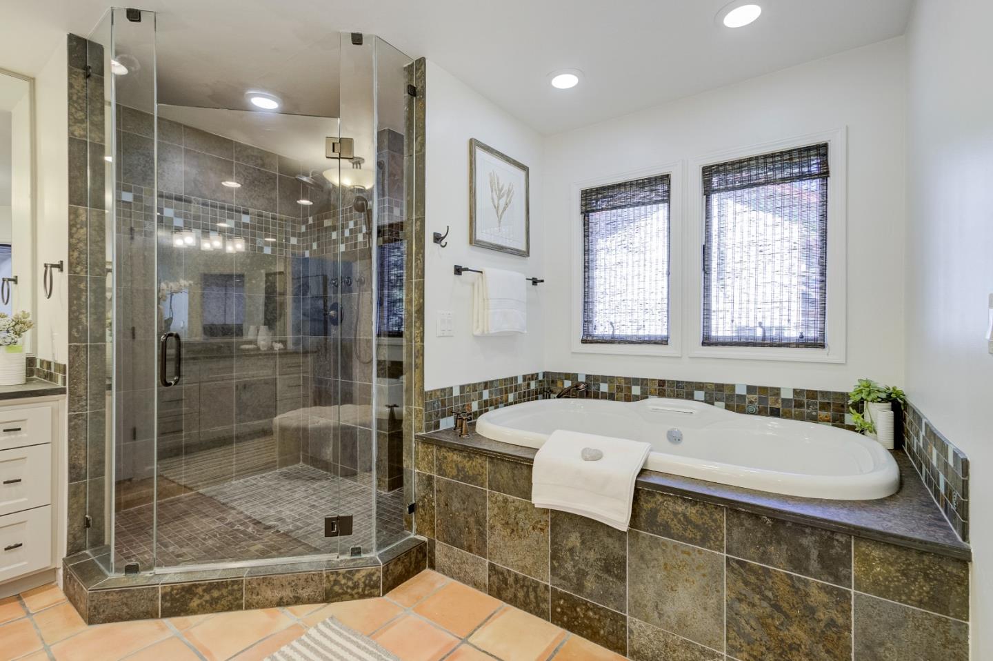 370 Quinnhill Road Los Altos, CA 94024 - Photo 44 of 58 a bathroom with a tub a sink and shower