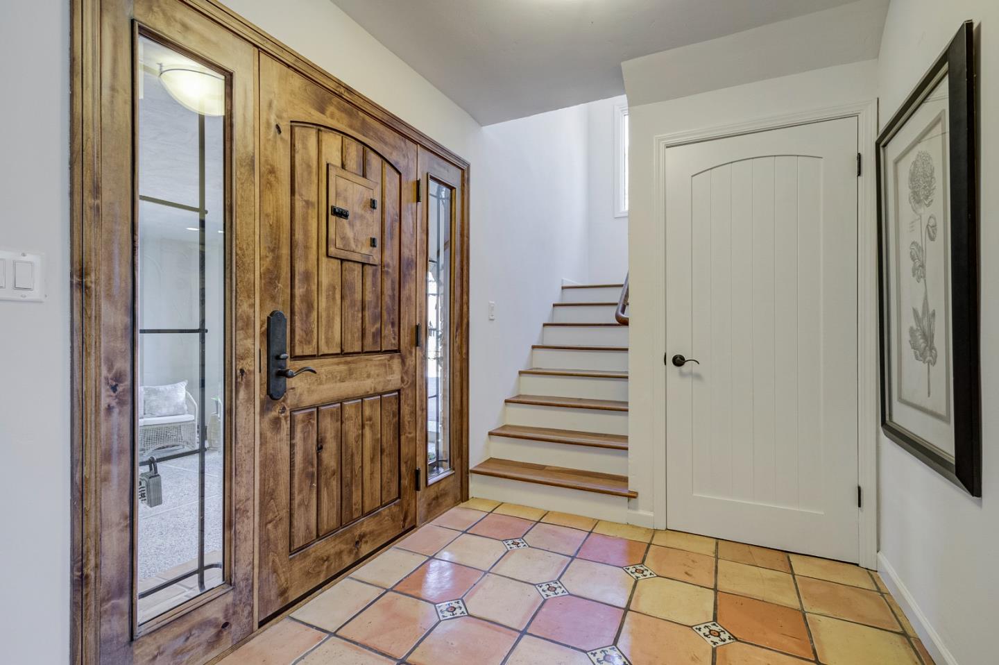 370 Quinnhill Road Los Altos, CA 94024 - Photo 5 of 58 a view of a hallway with wooden floor and staircase