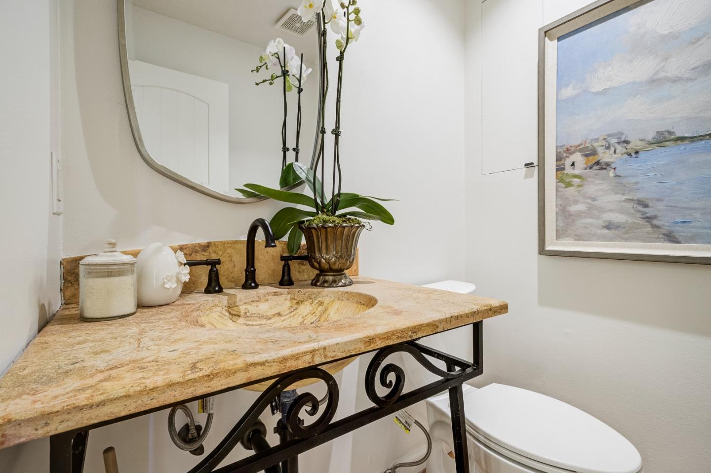370 Quinnhill Road Los Altos, CA 94024 - Photo 6 of 58 a bathroom with a granite countertop sink a toilet and mirror