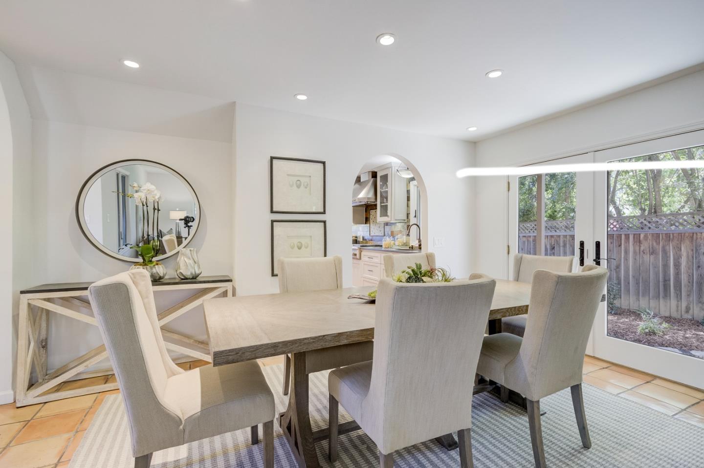 370 Quinnhill Road Los Altos, CA 94024 - Photo 10 of 58 a view of a dining room with furniture a rug and wooden floor