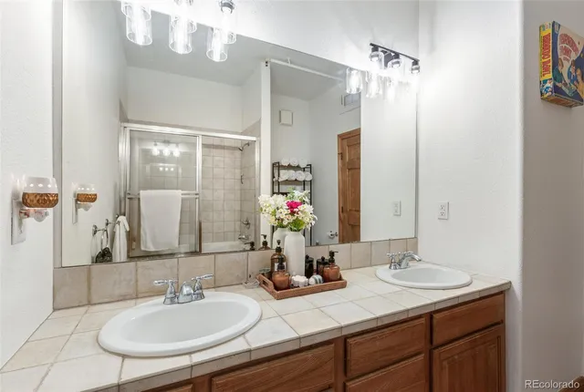 a view of a workspace with furniture and wooden floor