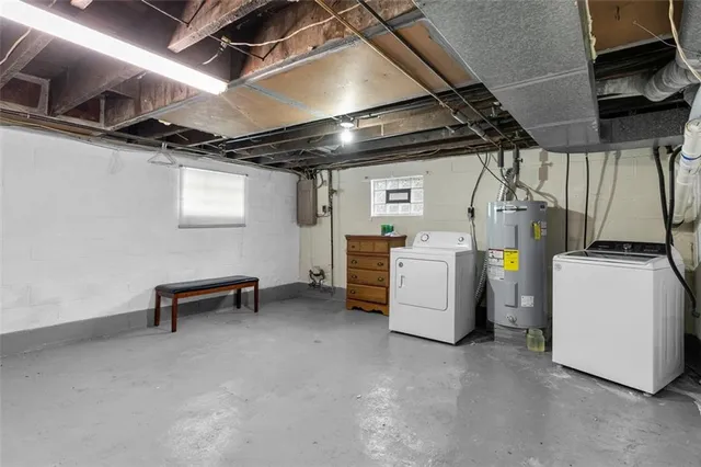 a view of empty room with wooden walls