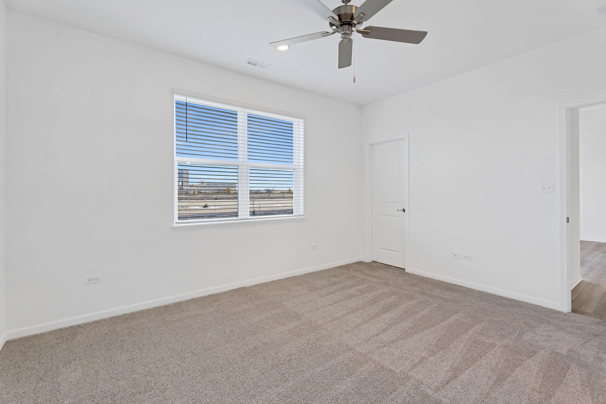 511 East 127th Place Crown Point, IN 46307 - Photo 14 of 22 an empty room with a window
