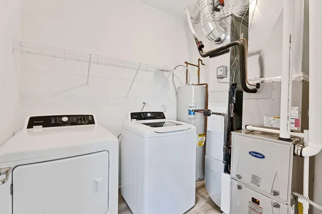 a utility room with dryer and washer