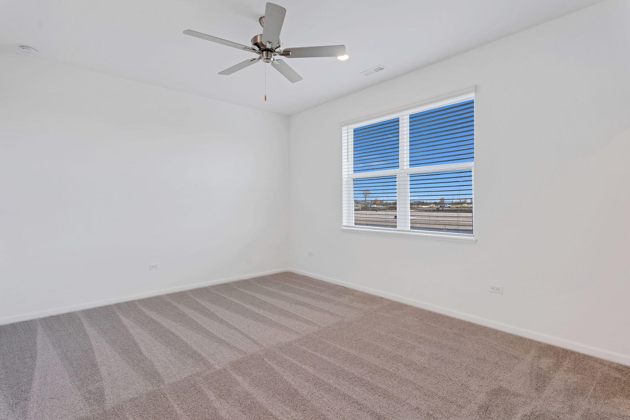 511 East 127th Place Crown Point, IN 46307 - Photo 10 of 22 wooden floor in an empty room with a window