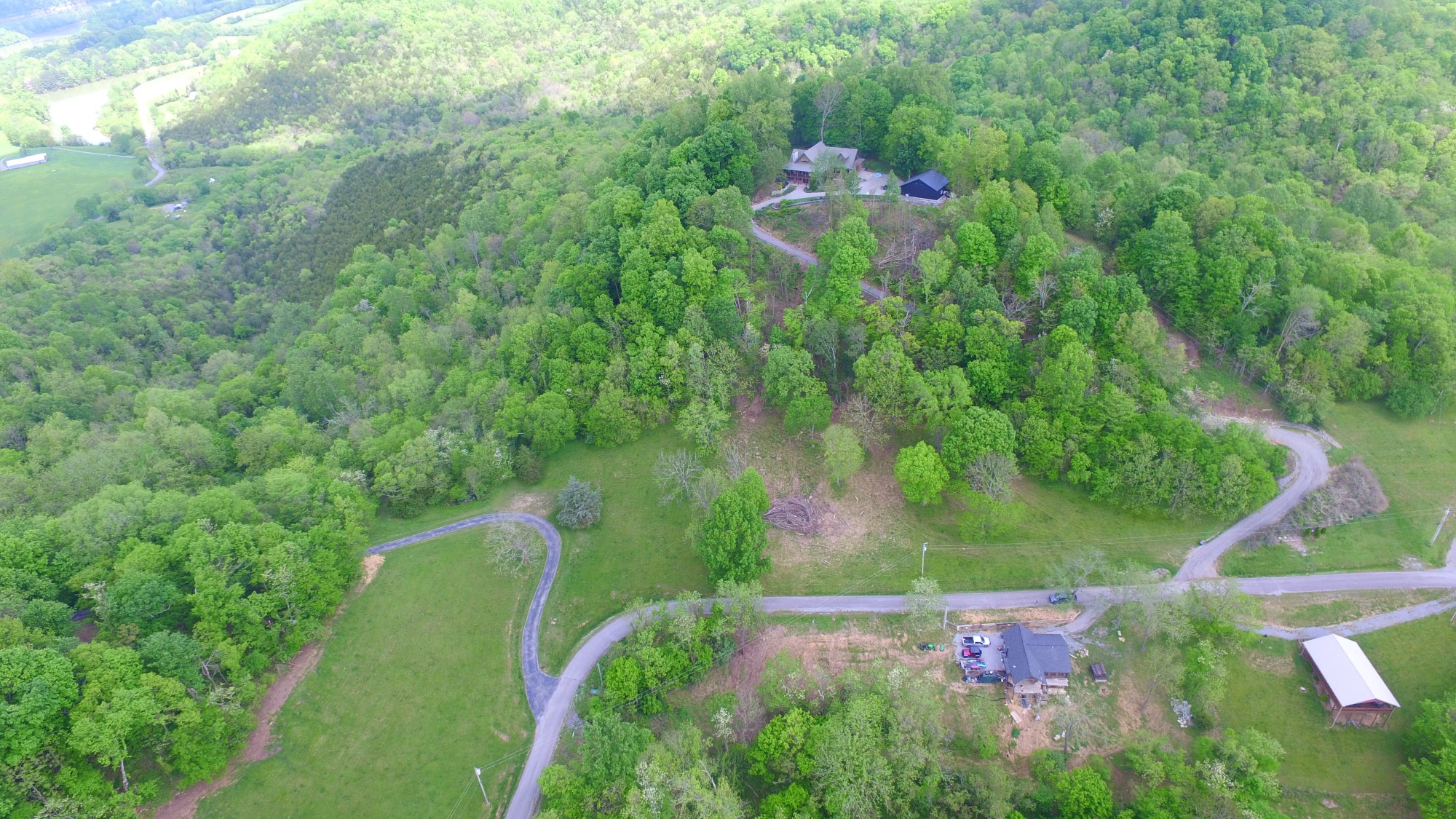 0 Eagle Mountain Road Granville, TN 38564 - Photo 2 of 9 an aerial view of residential house with outdoor space and trees all around
