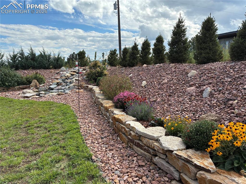 8480 Delaware Road Colorado Springs, CO 80926 - Photo 48 of 49 Summer 2025- View of yard