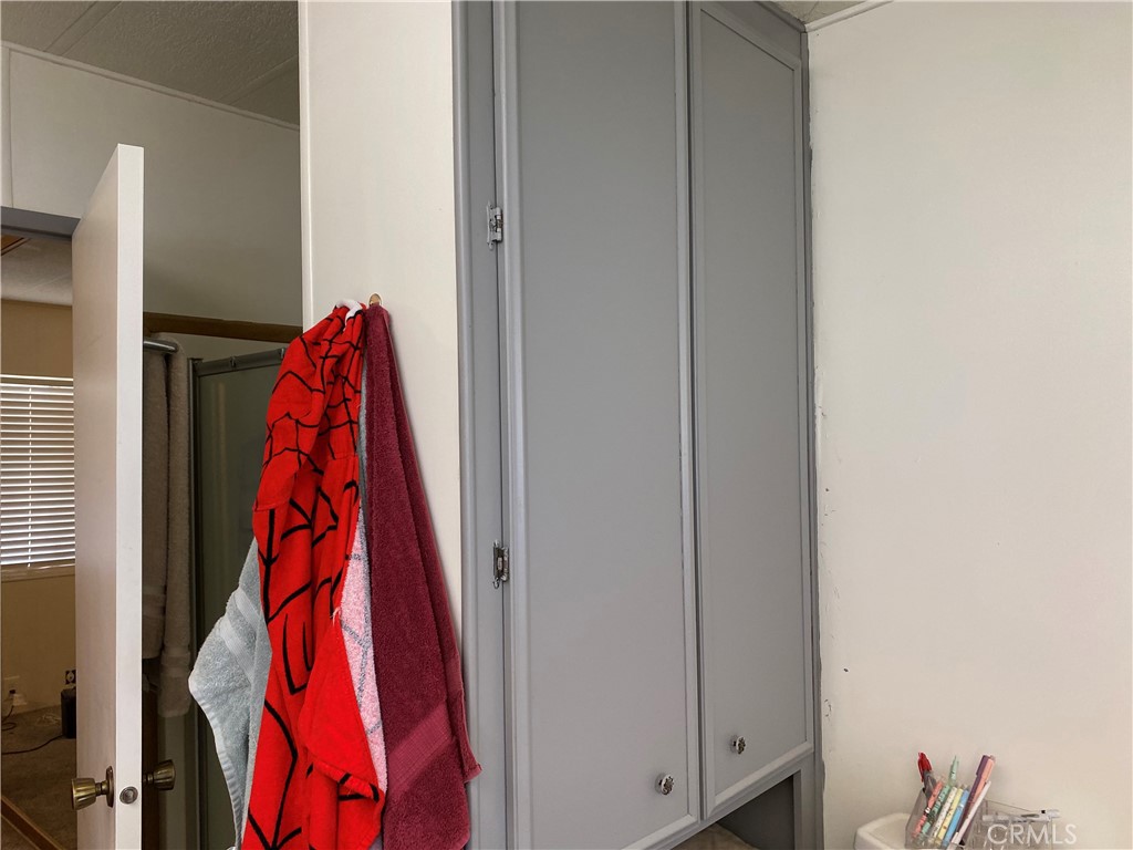 20683 Waalew Road, Unit B161 Apple Valley, CA 92307 - Photo 21 of 30 Primary Bathroom with Built-In Storage