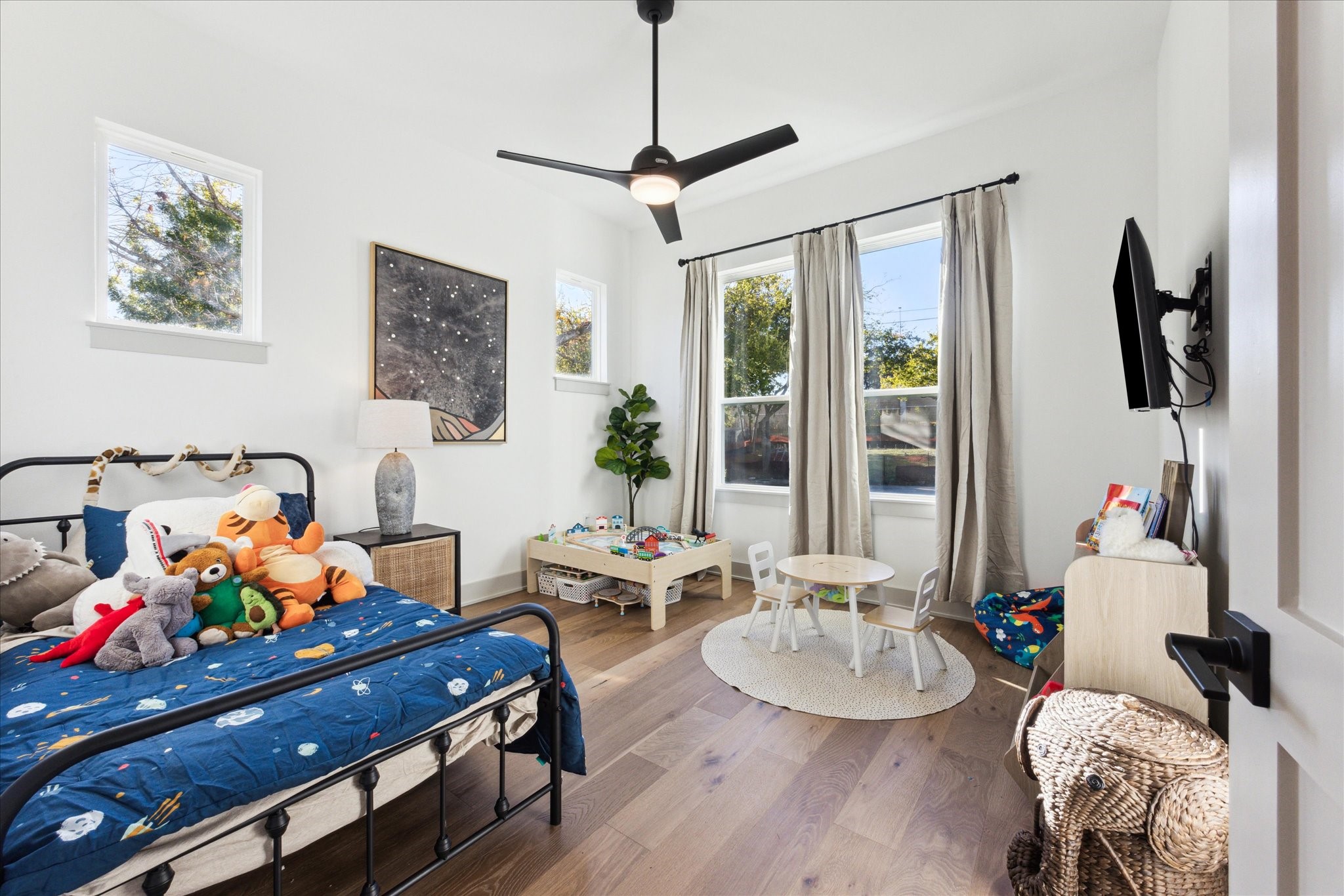 3001 Funston Street Austin, TX 78703 - Photo 11 of 27 a room with furniture toys and a large window