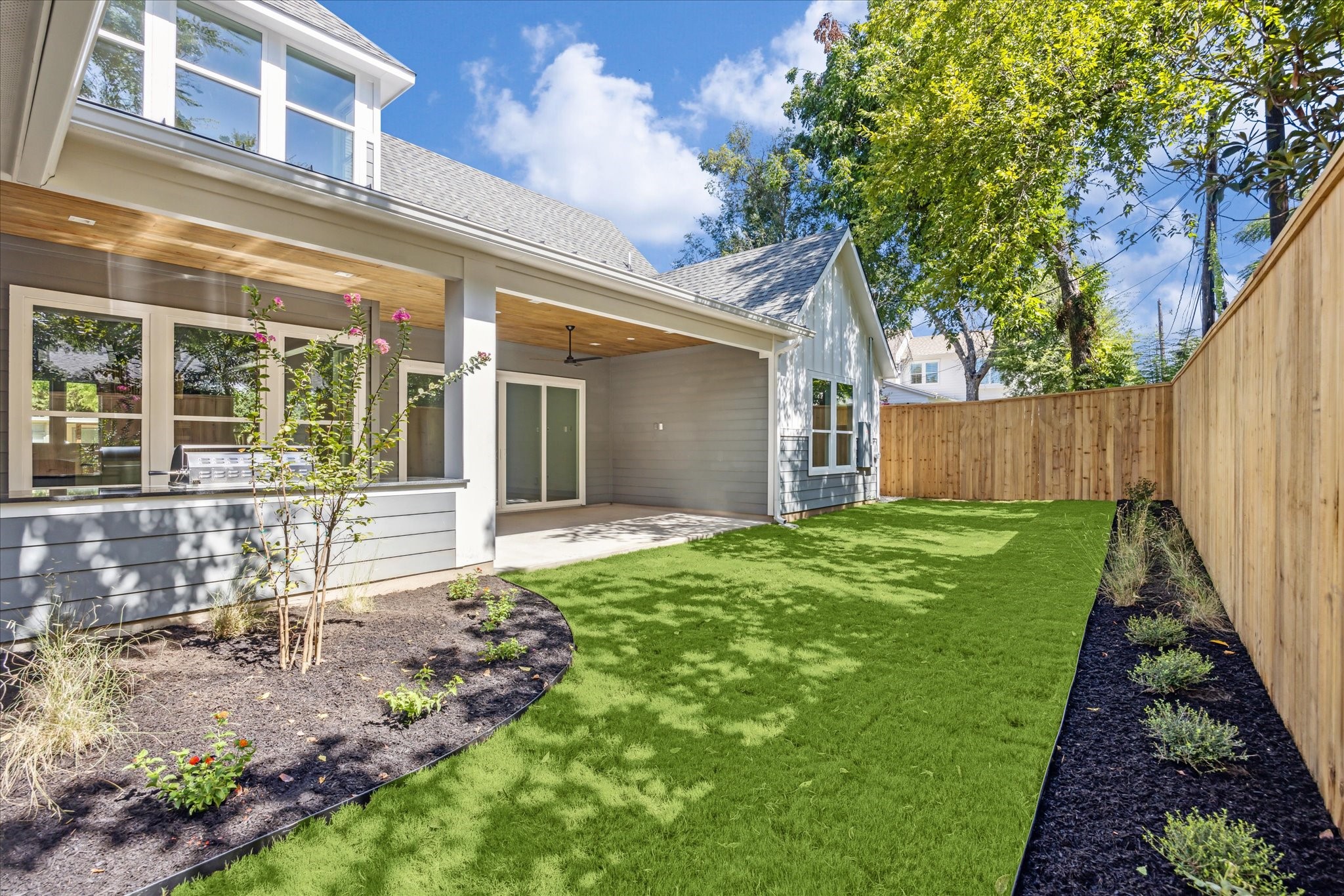 3001 Funston Street Austin, TX 78703 - Photo 21 of 27 front view of a house with a yard