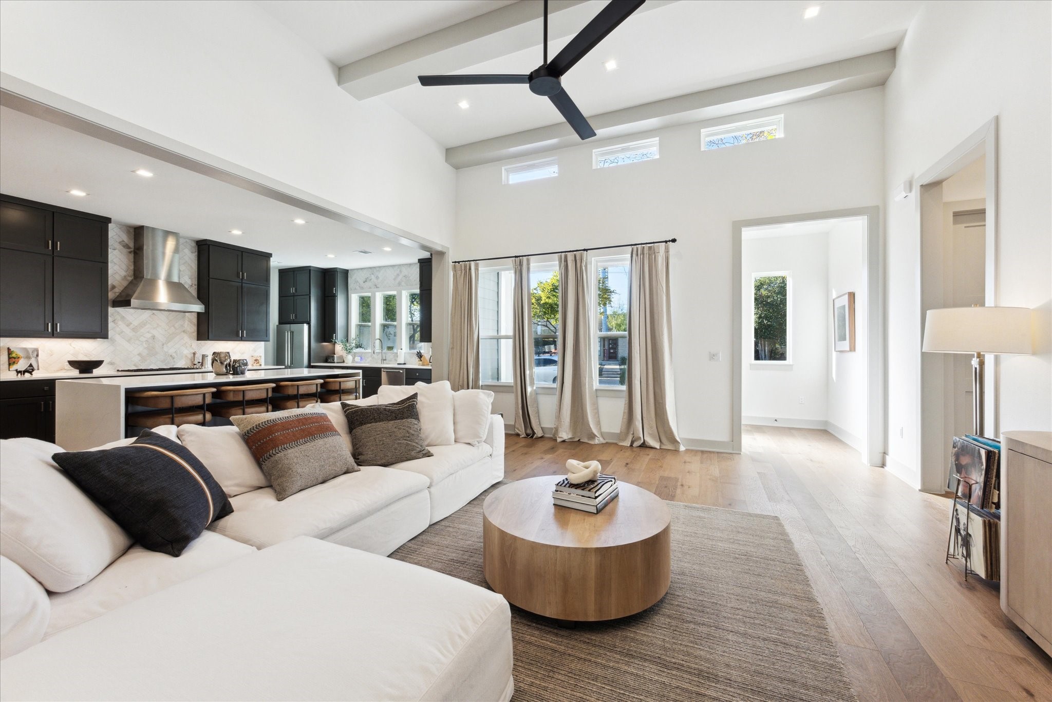3001 Funston Street Austin, TX 78703 - Photo 27 of 27 a living room with furniture and a view of kitchen