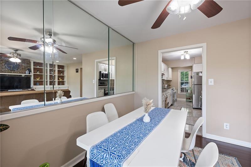 2674 Farmstead Road Smyrna, GA 30080 - Photo 12 of 25 a living room with furniture and a large window