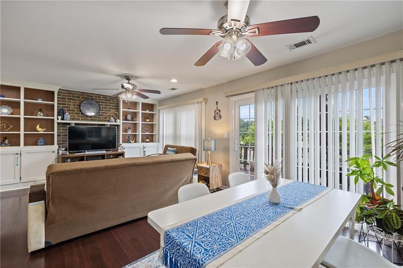 2674 Farmstead Road Smyrna, GA 30080 - Photo 9 of 25 a living room with furniture and a flat screen tv