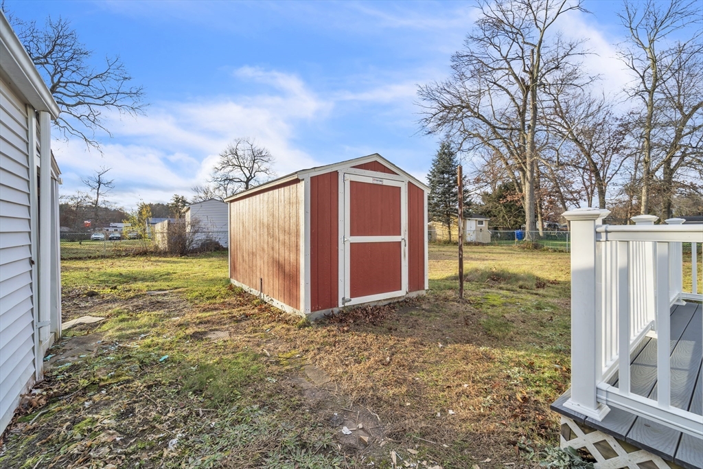 82 Louis Road Springfield, MA 01118 - Photo 17 of 24 a view of a back yard of the house