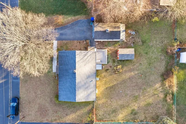 a picture of a book and a white wall