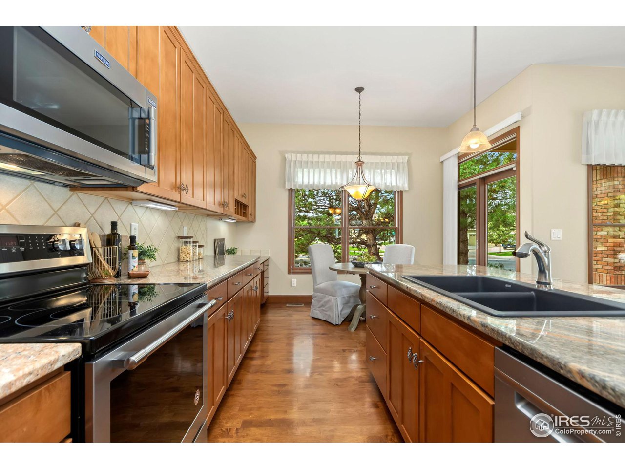 8209 Spinnaker Bay Drive Windsor, CO 80528 - Photo 12 of 26 a kitchen with lots of counter top space