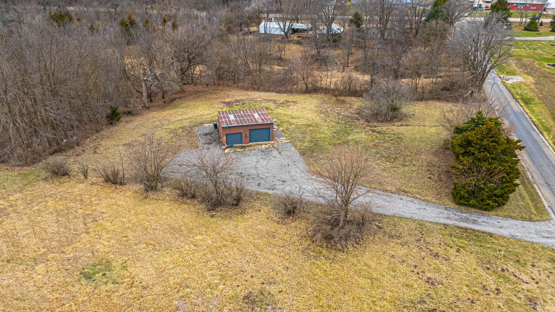 14111 Twin Grove Road Bloomington, IL 61705 - Photo 1 of 6 a view of a yard with plants