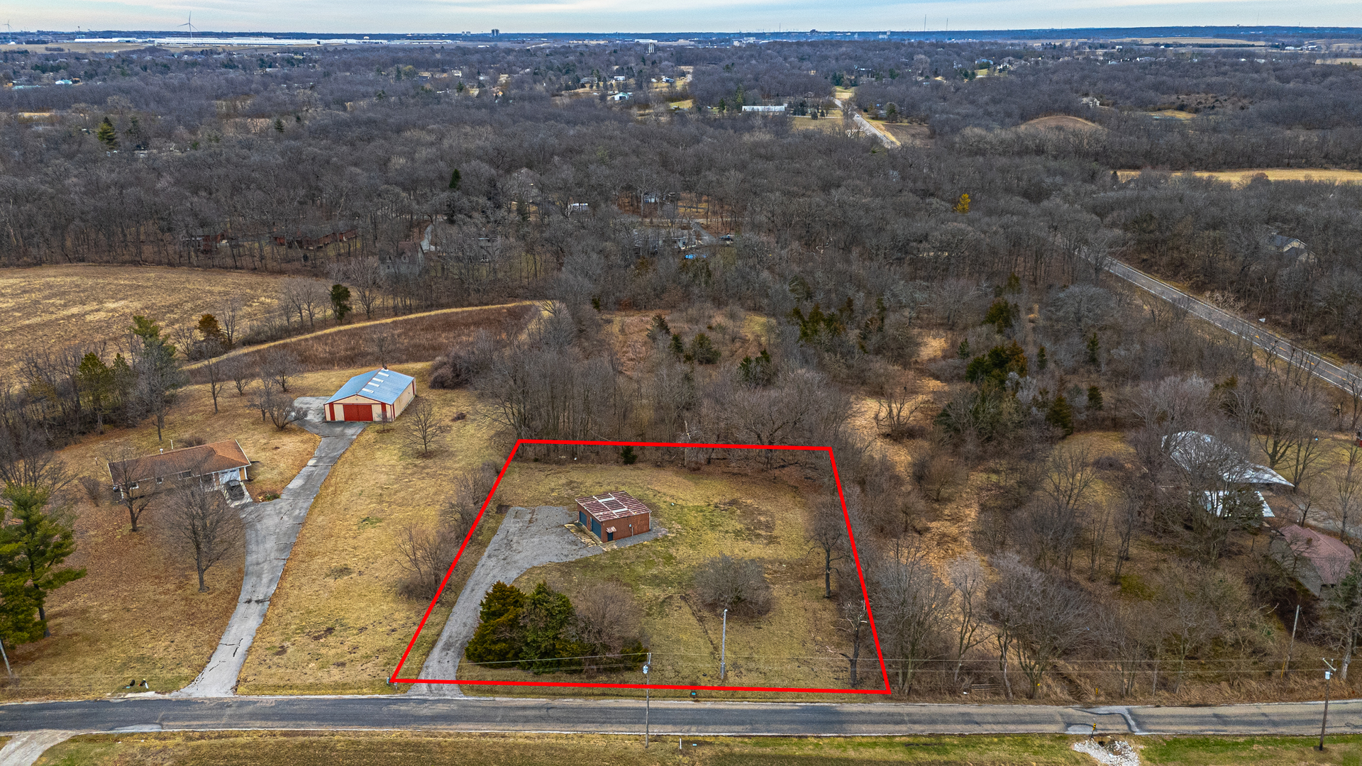 14111 Twin Grove Road Bloomington, IL 61705 - Photo 2 of 6 an aerial view of a houses