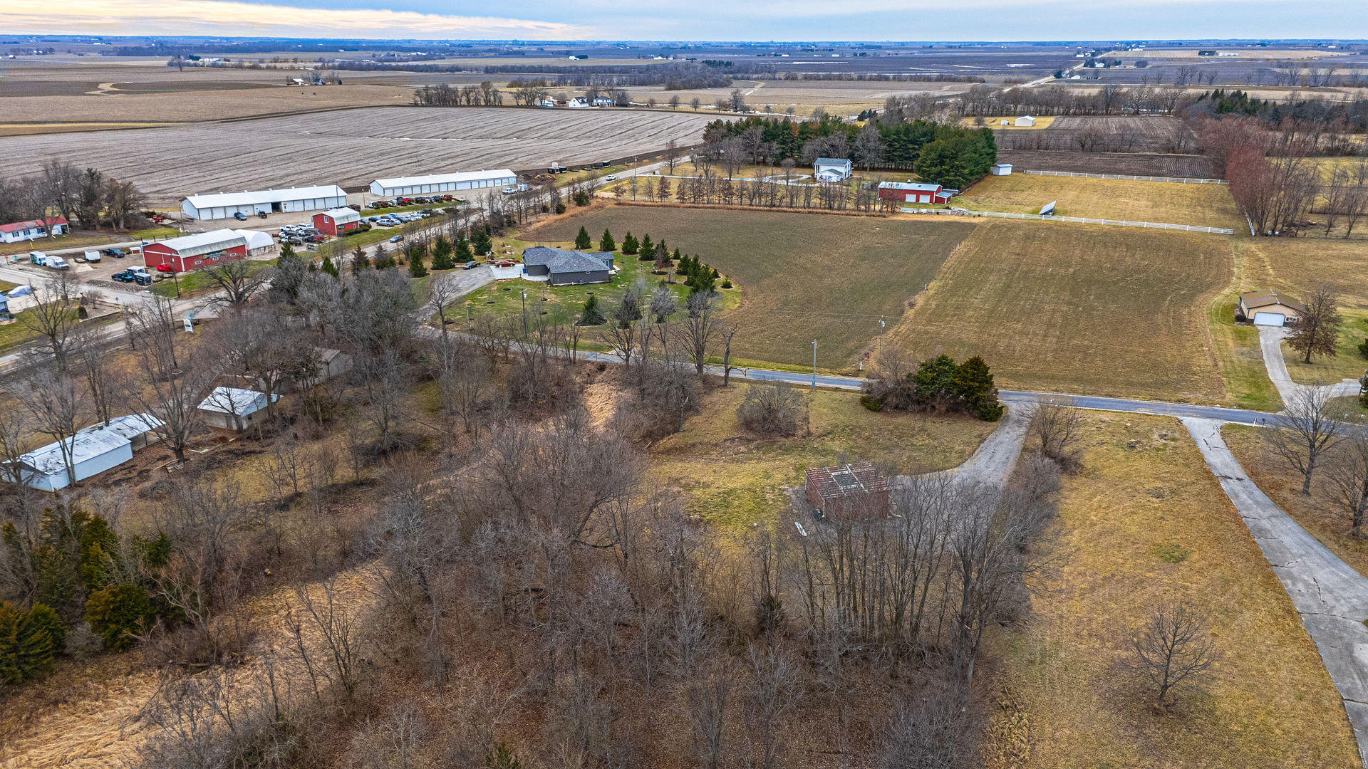 14111 Twin Grove Road Bloomington, IL 61705 - Photo 4 of 6 a view of a lake with a yard