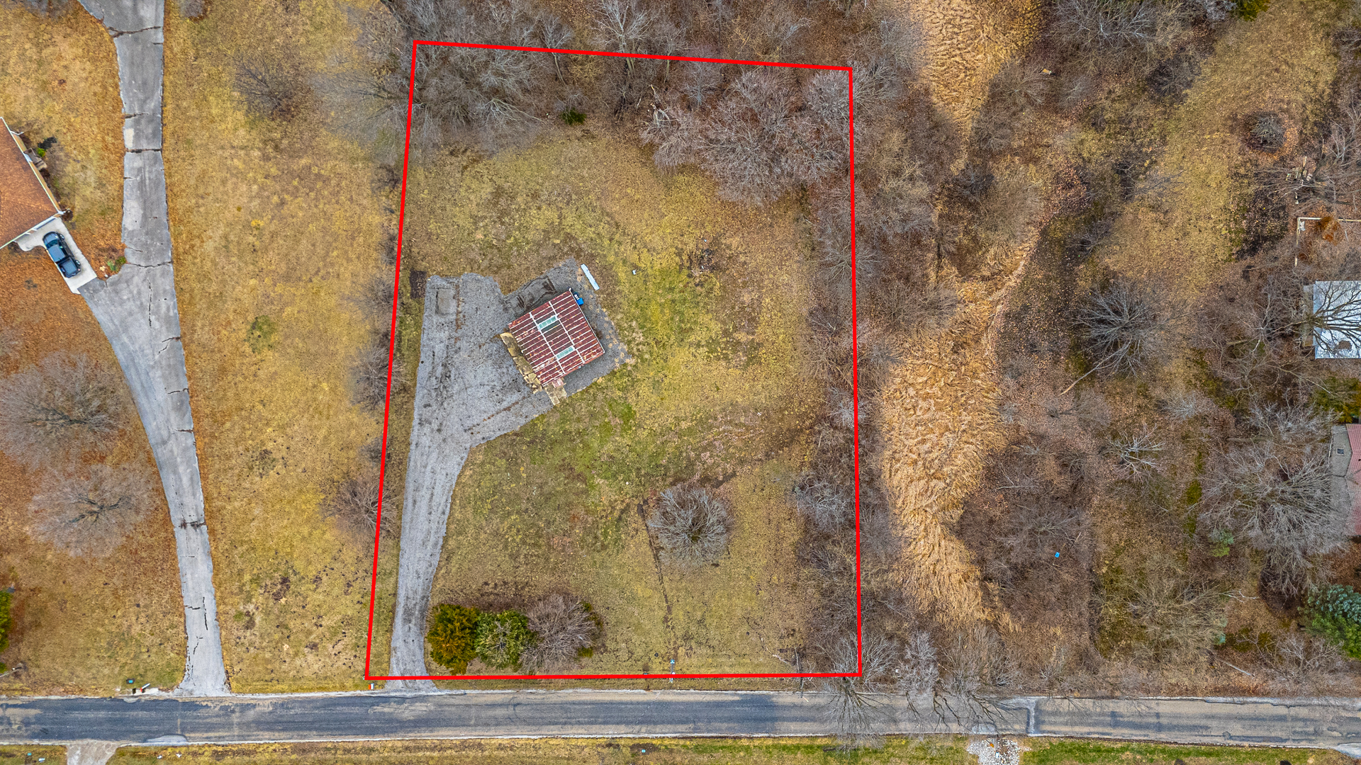 14111 Twin Grove Road Bloomington, IL 61705 - Photo 5 of 6 a bathroom with a shower and a sink