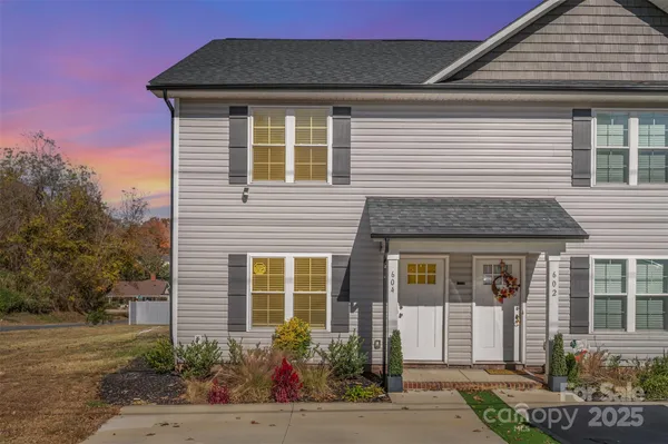 a front view of a house with a porch