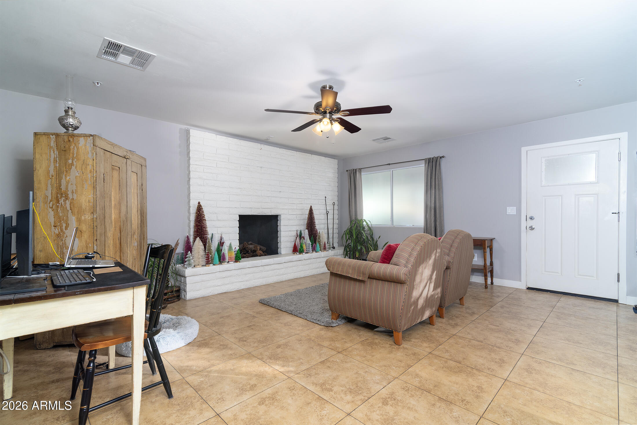 822 East Montecito Avenue Phoenix, AZ 85014 - Photo 13 of 48 a living room with furniture and a fireplace