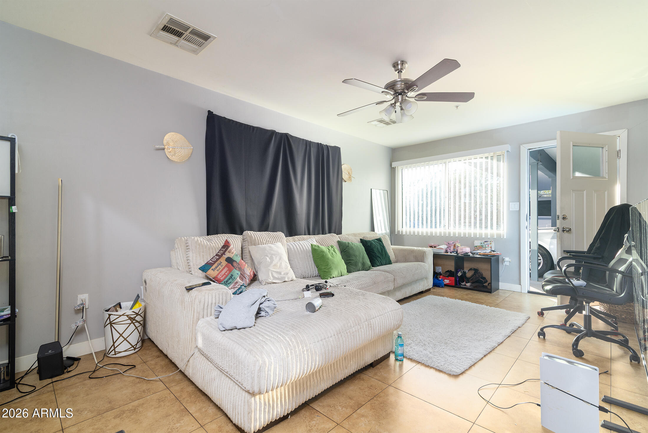 822 East Montecito Avenue Phoenix, AZ 85014 - Photo 21 of 48 a bedroom with a bed a couches and large windows