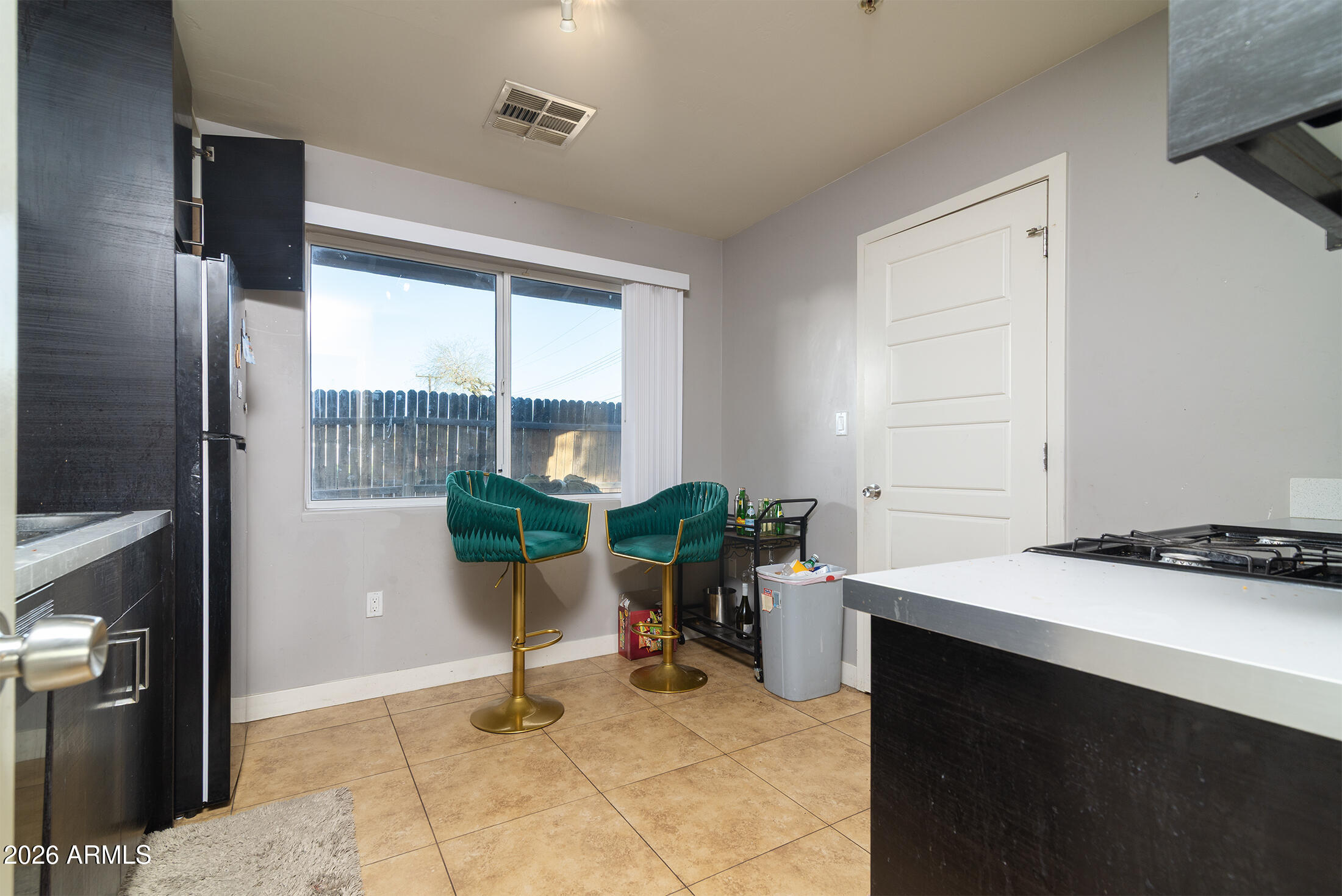 822 East Montecito Avenue Phoenix, AZ 85014 - Photo 24 of 48 a view of a workspace with furniture and a window