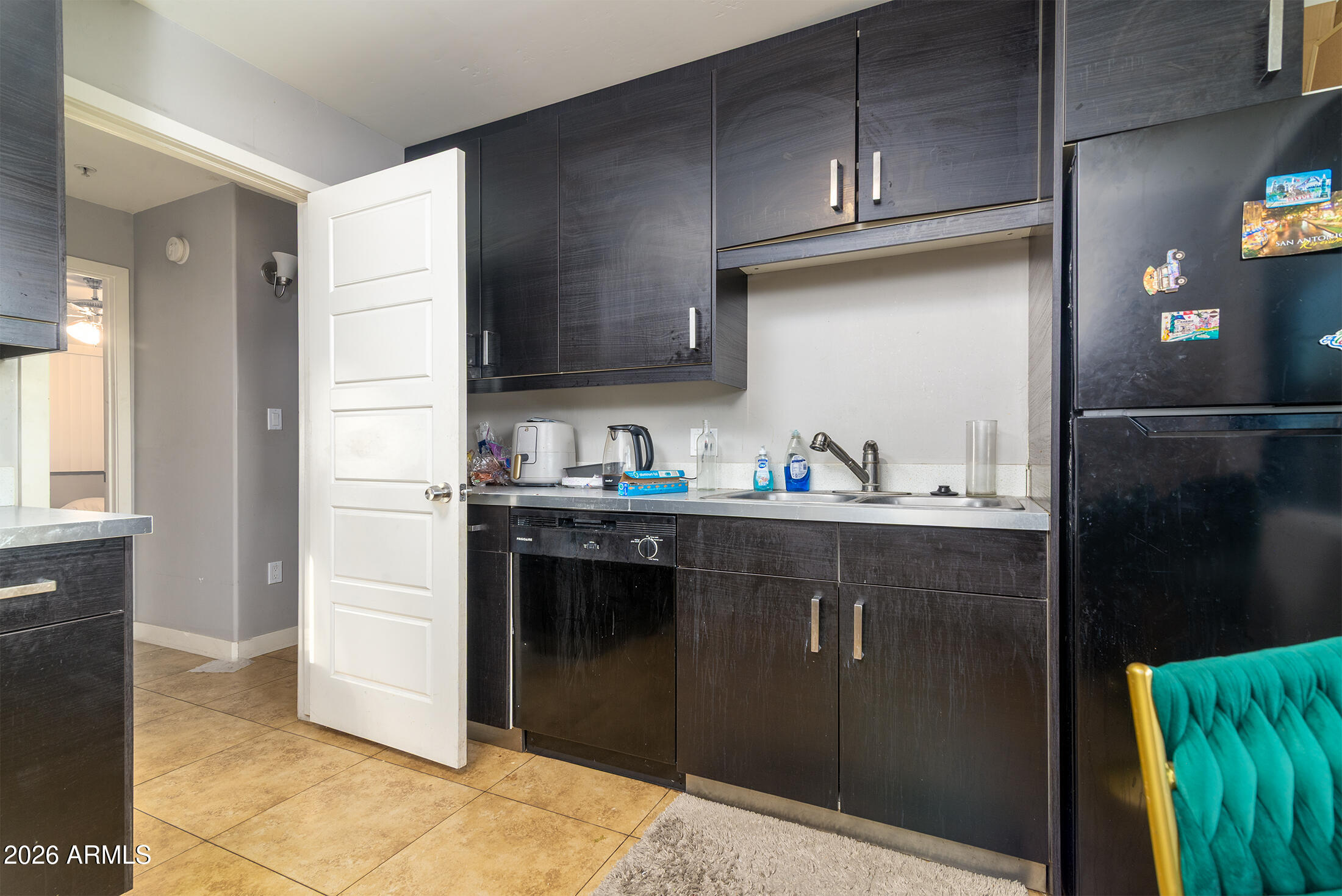 822 East Montecito Avenue Phoenix, AZ 85014 - Photo 25 of 48 a kitchen with stainless steel appliances granite countertop a refrigerator and a sink