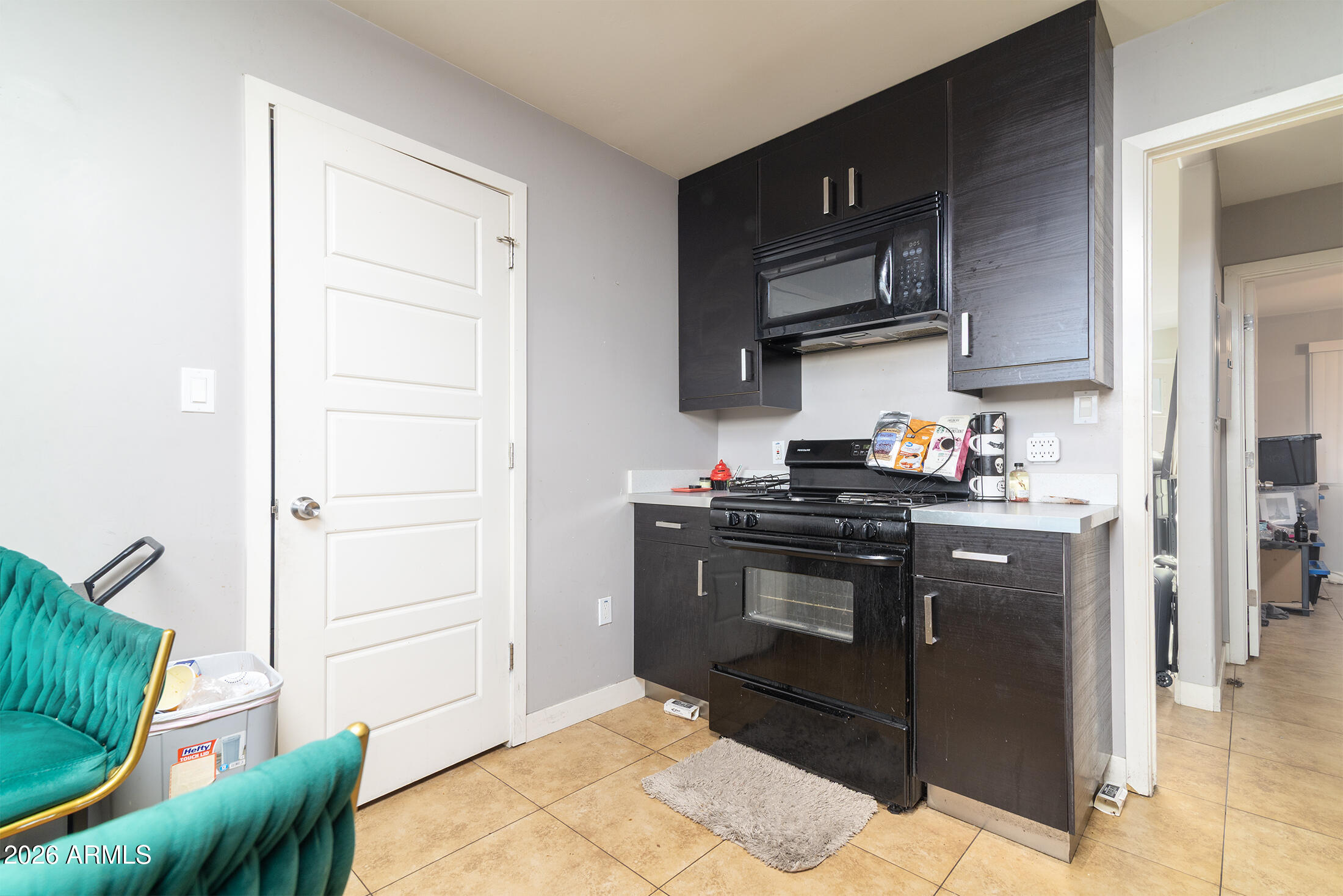 822 East Montecito Avenue Phoenix, AZ 85014 - Photo 26 of 48 a kitchen with stainless steel appliances granite countertop a stove a sink and a refrigerator