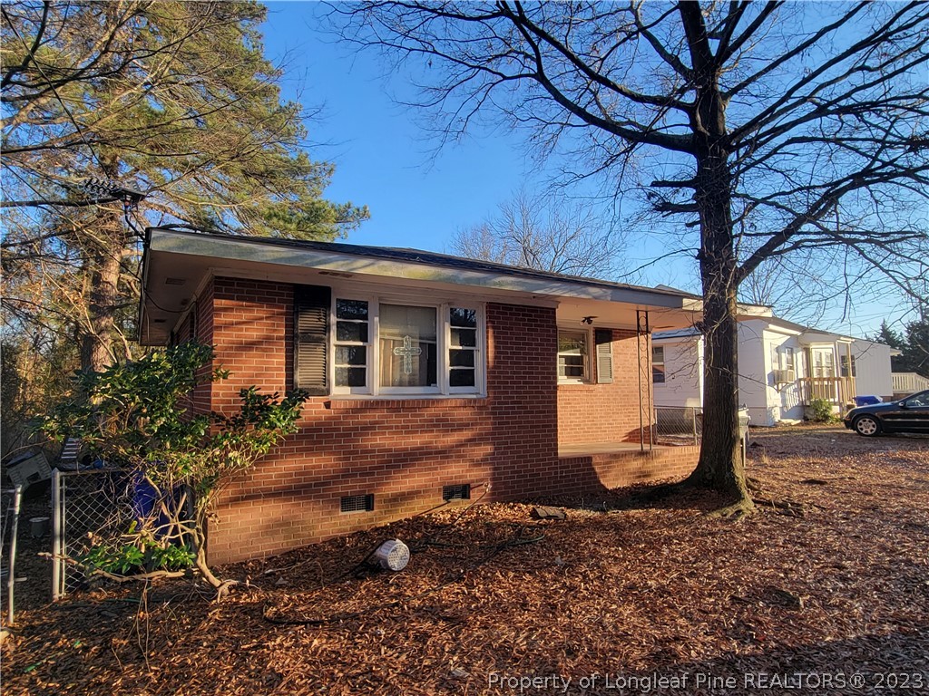 705 Eva Circle Spring Lake, NC 28390 - Photo 3 of 21 a view of a house with backyard