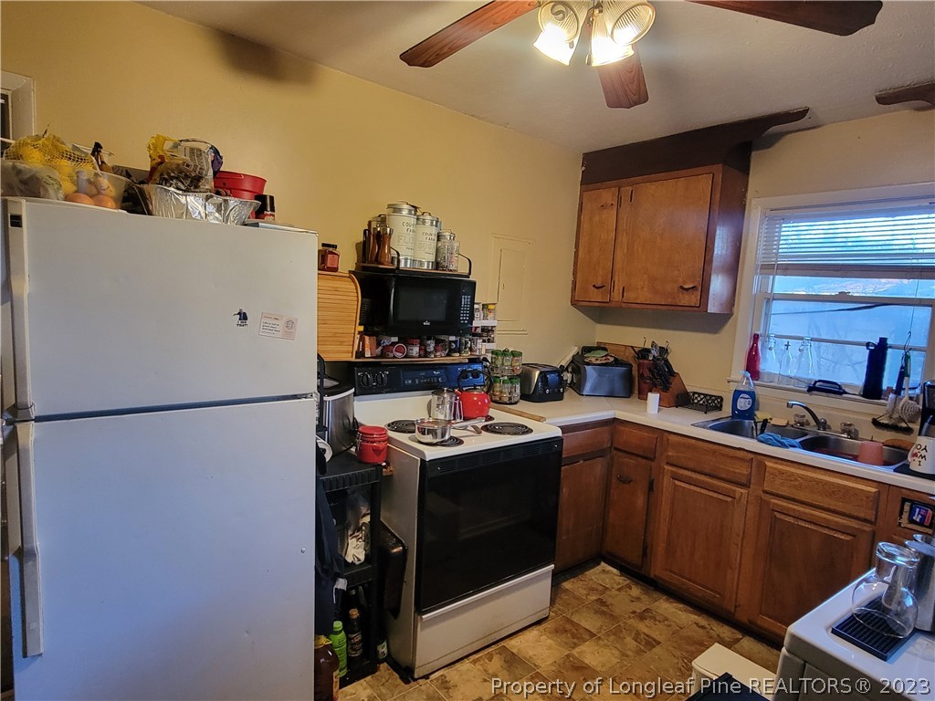 705 Eva Circle Spring Lake, NC 28390 - Photo 7 of 21 a room with storage and utility