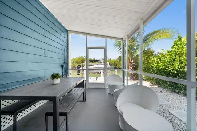 a outdoor dining space with furniture