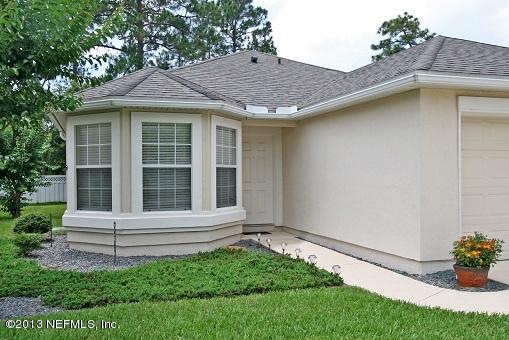 1825 Keswick Road St. Augustine, FL 32084 - Photo 3 of 19 a view of house with a garden