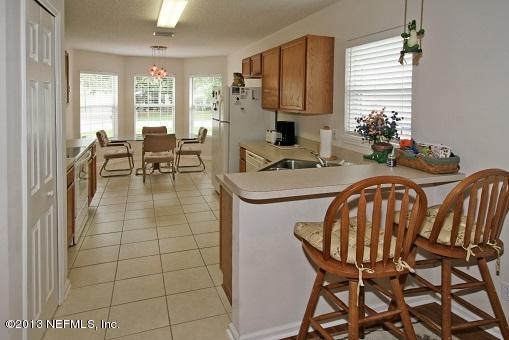 1825 Keswick Road St. Augustine, FL 32084 - Photo 7 of 19 a dining room with furniture and window