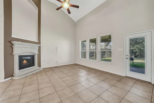 a view of an empty room with windows