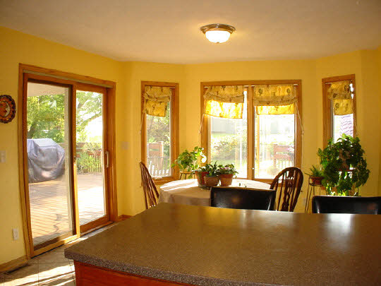 9845 Rambouillet Ridge Roscoe, IL 61073 - Photo 5 of 11 a living room with furniture and floor to ceiling window