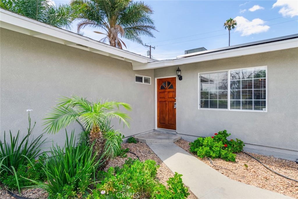 8955 Holly Lane Riverside, CA 92503 - Photo 2 of 32 a front view of a house with garden