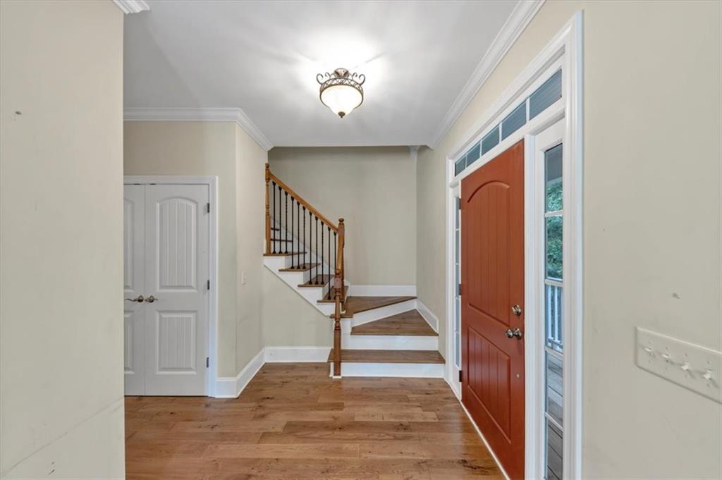 231 Beaver Ridge Road Jasper, GA 30143 - Photo 14 of 80 a view of entryway with stairs and wooden floor