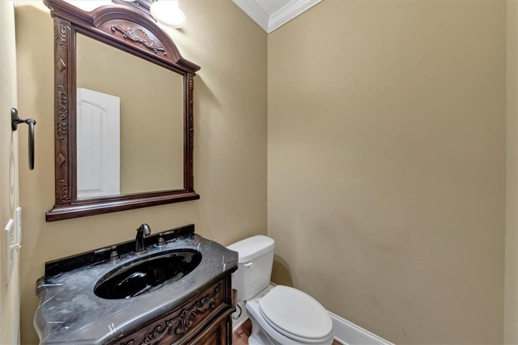 231 Beaver Ridge Road Jasper, GA 30143 - Photo 18 of 80 a bathroom with a sink and a toilet