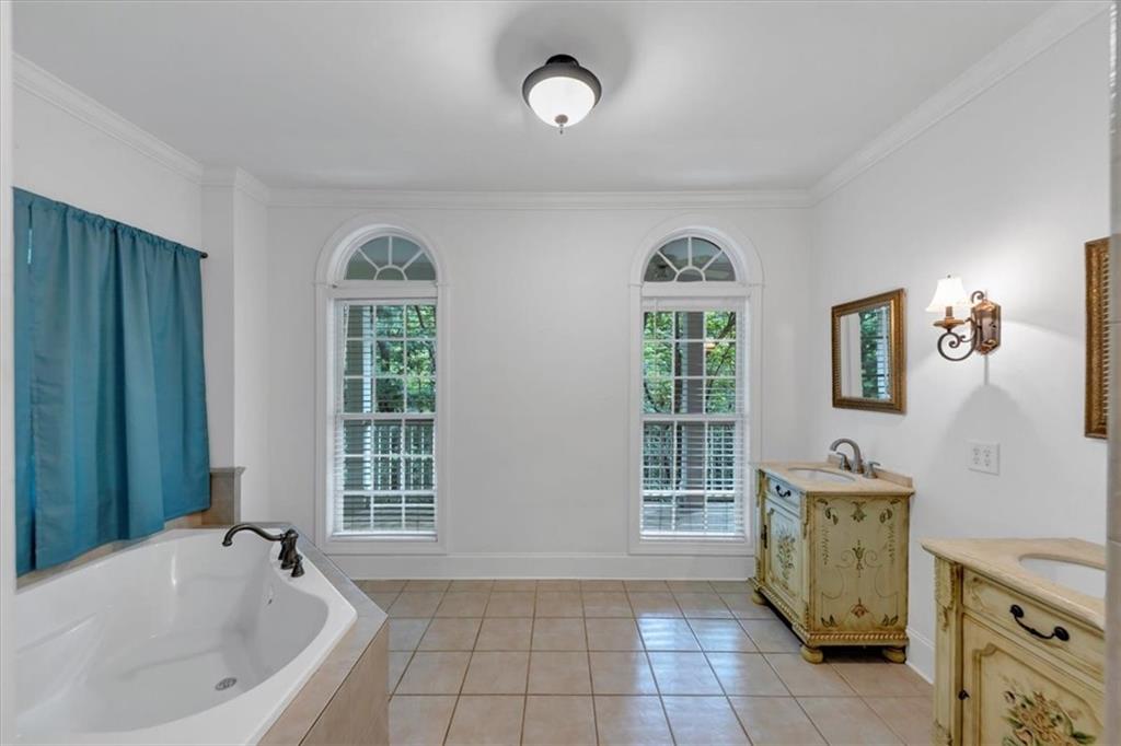 231 Beaver Ridge Road Jasper, GA 30143 - Photo 35 of 80 a bathroom with a tub sink and window